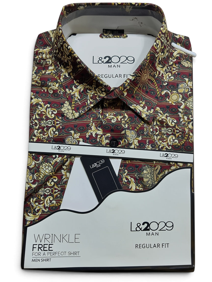 A folded L&2029 MAN men's dress shirt with an intricate baroque-style paisley pattern in red, gold, and black, presented with its white retail packaging card.