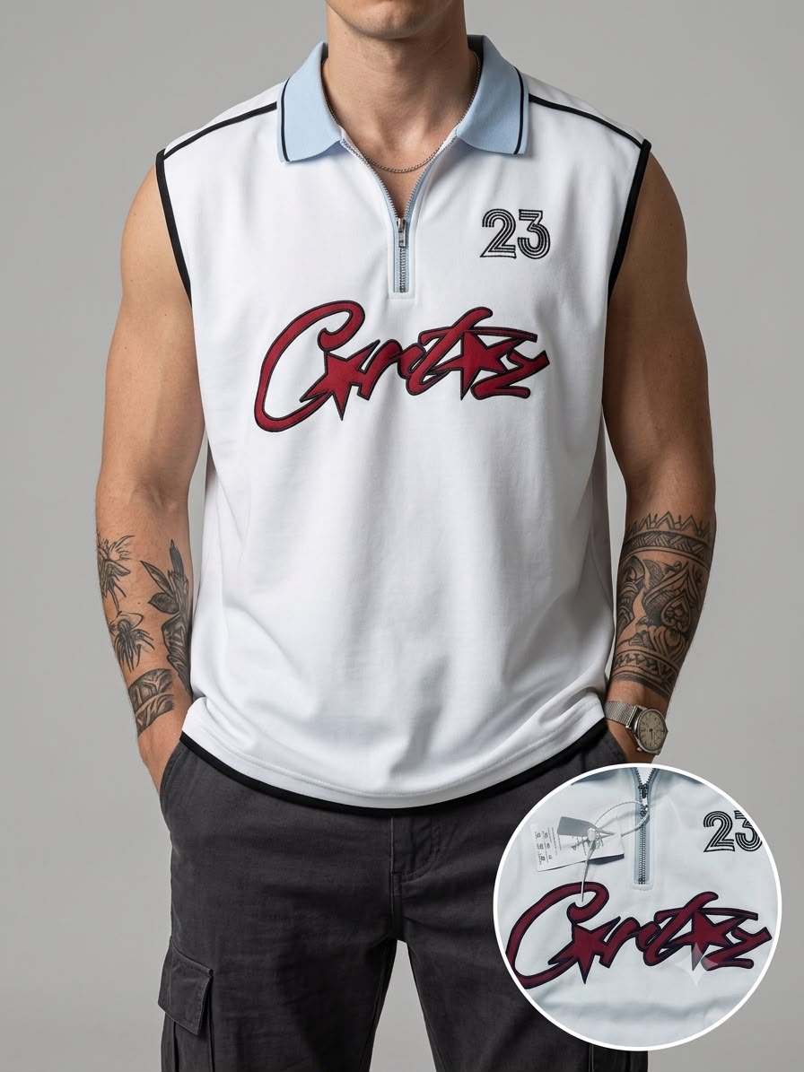 A man wearing a sleeveless white polo shirt with a light blue collar, black trim, a half-zip neckline, and a large red script logo on the front. The number 23 is printed on the upper right chest.