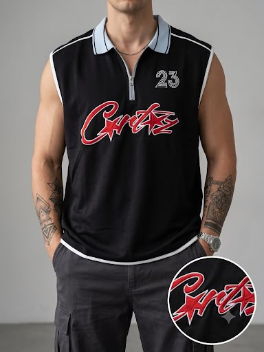 A man wearing a sleeveless black polo-style top with a half-zip collar, white piping, a red script logo reading 'Cartez' across the chest, and the number 23 on the upper right chest. The photo is cropped from neck to upper thighs against a plain light gray studio background, with a circular inset showing a close-up of the chest logo.
