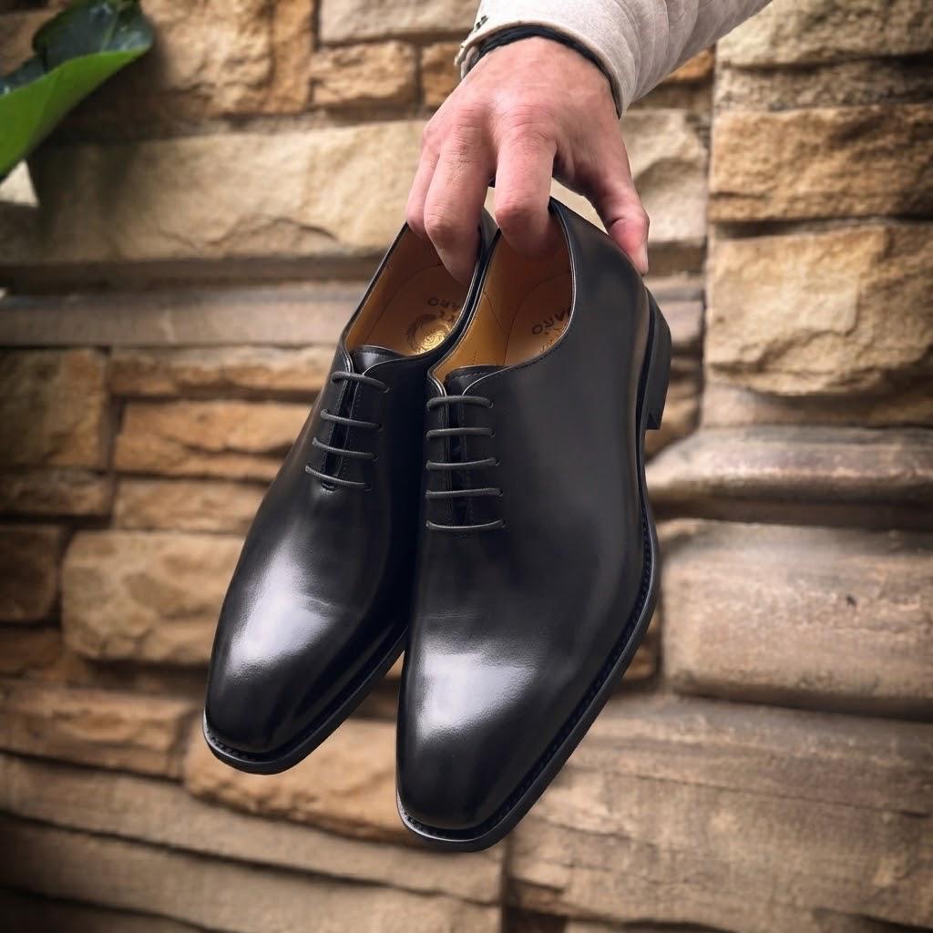 Solid black Berluti leather shoe